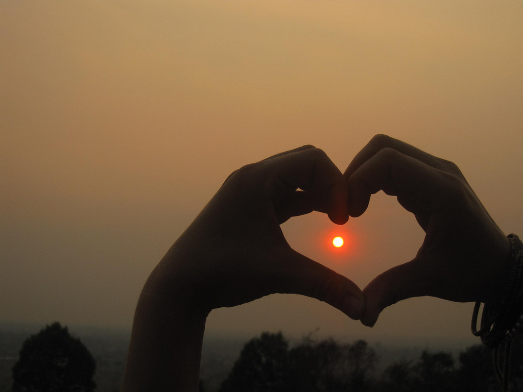 Pinching the sun on the towers of Angkor Wat