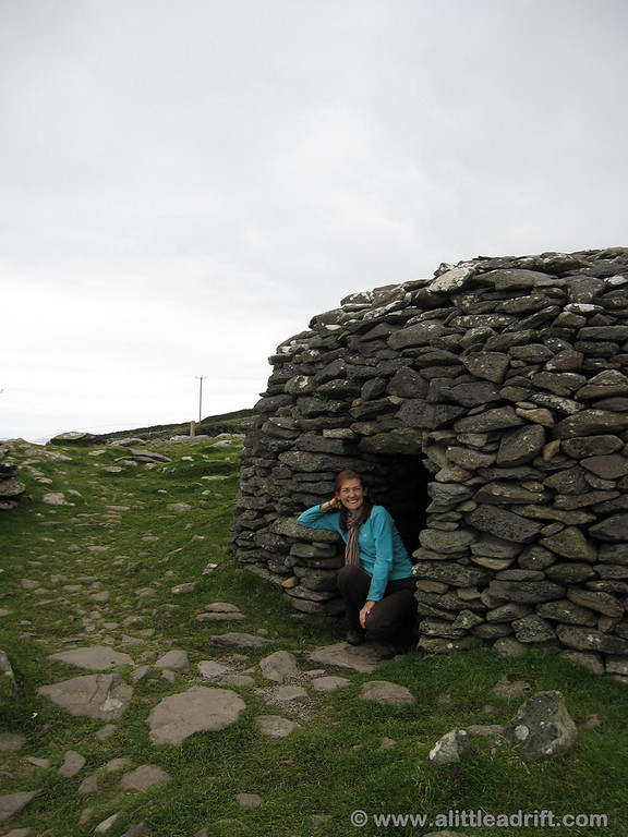 tiny beehive hut opening at the second stop on dingle's slea head drive
