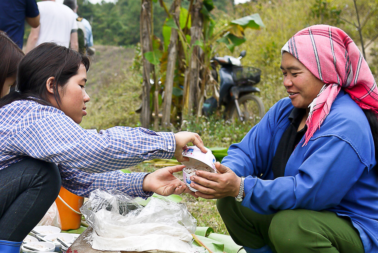 Serving up rice for the coffee journey participants.