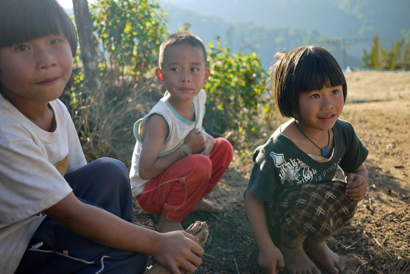 The sweet faces of children in the Akha Ama coffee village near Chiang Mai, Thailand.