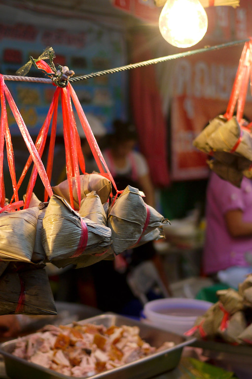 Food for sale at a street food market in Chiang Mai during Chinese New Year festivities.