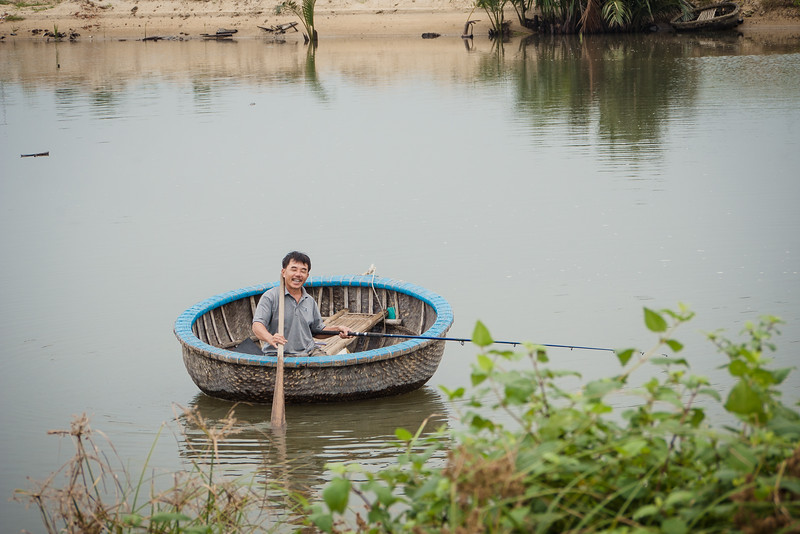 Smiles from an local Vietnamese man in a boat