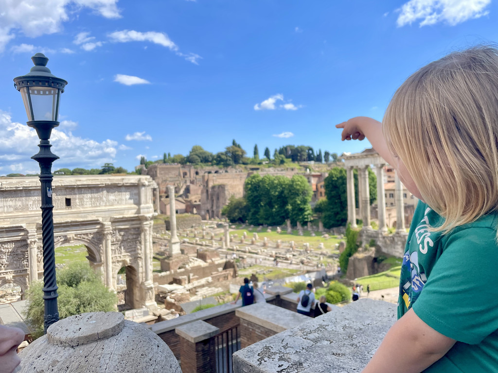 My toddler looks out over the Roman Forum