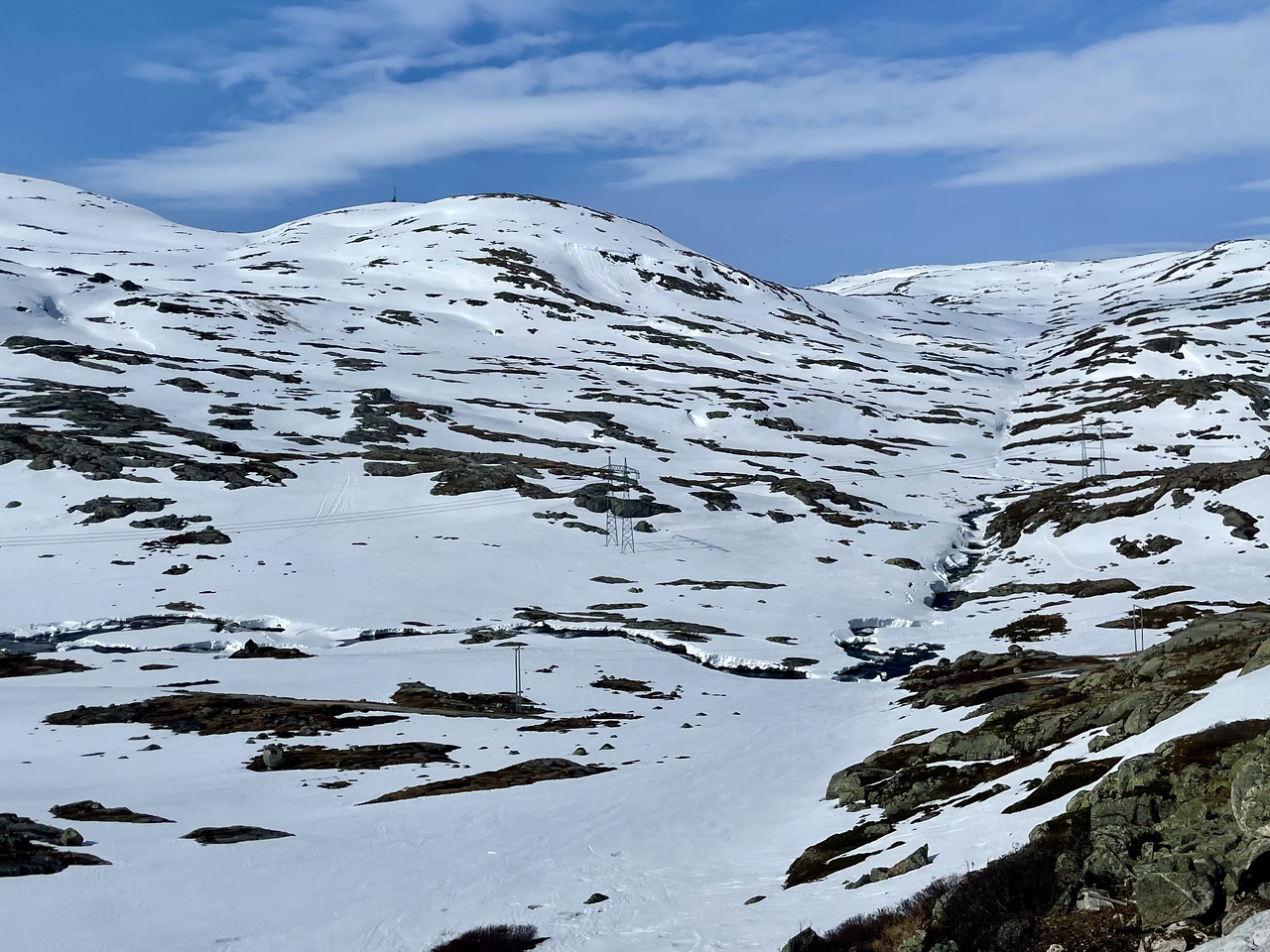 snow above the treeline in Norway on the Olso to Bergen train from the tree window