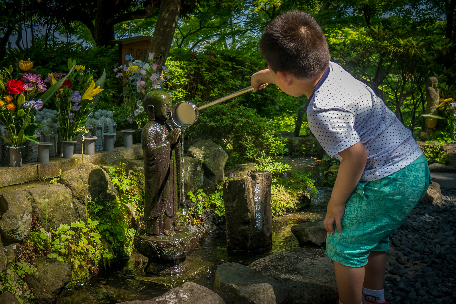 worshipping at Jizō Hase-dera Temple in Kamakura, Japan