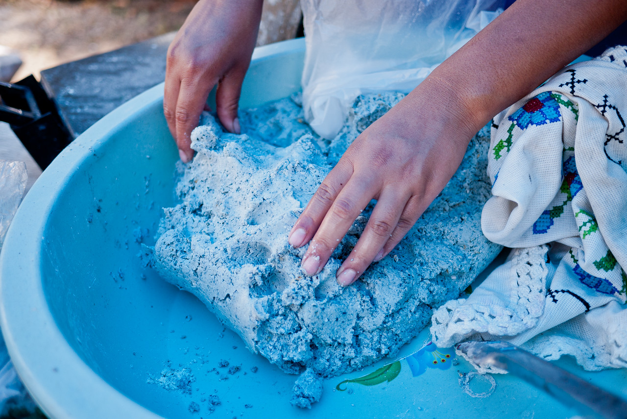 Blue corn tortilla dough. Learning how to make blue corn tortillas in from a street food vendor in Mexico.