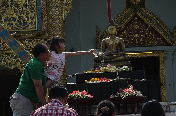 bathing the buddha during songkran

