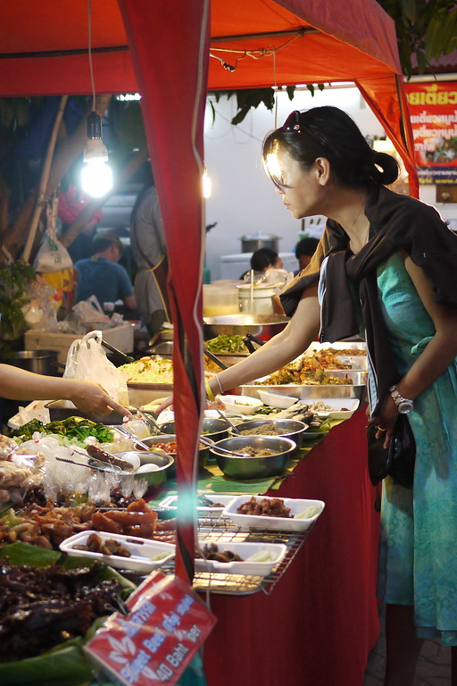 Food stalls at the Sunday night market, Chiang Mai, Thailand.