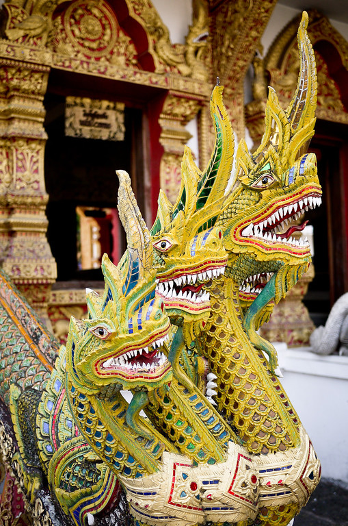 Elaborately decorated dragons at a temple (wat) in Chiang Mai, Thailand.