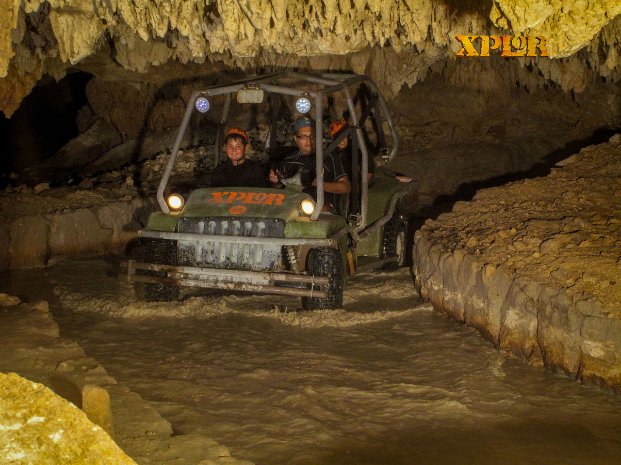 Amphibious Vehicles splashing in a cave at Xplor