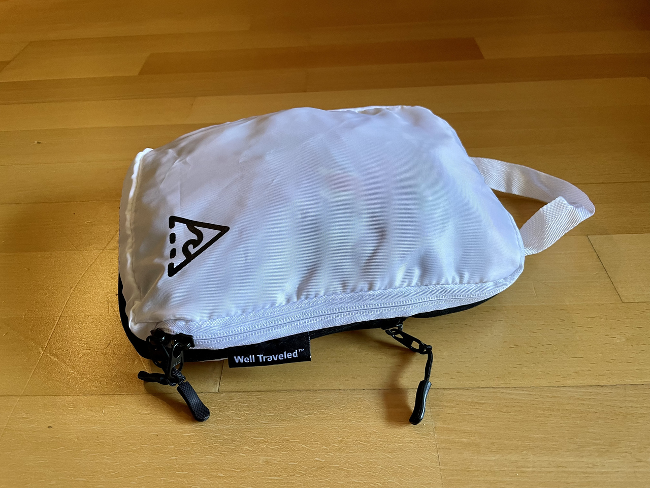 a compression packing cube zipped closed 