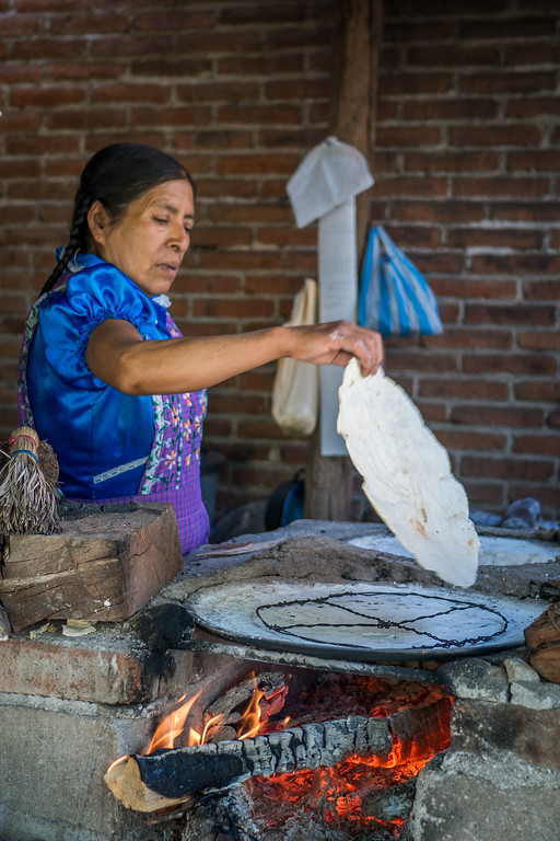 making traditional corn tortillas in Oaxaca